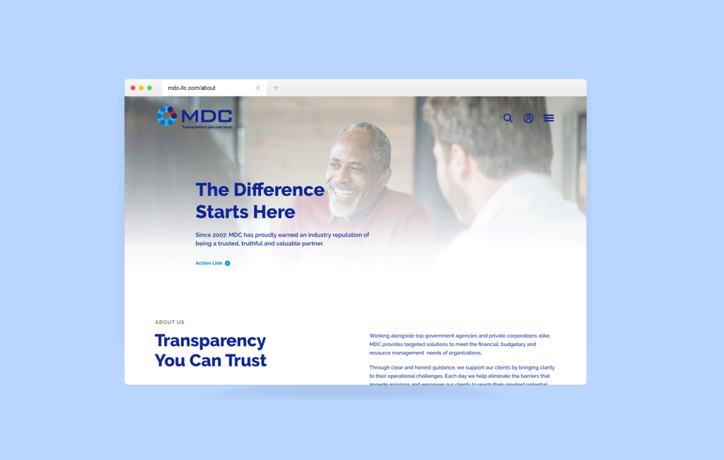 Web browser displaying the MDC business website with a banner headline reading "the difference transparency can make" featuring an image of a smiling man in discussion with another person.