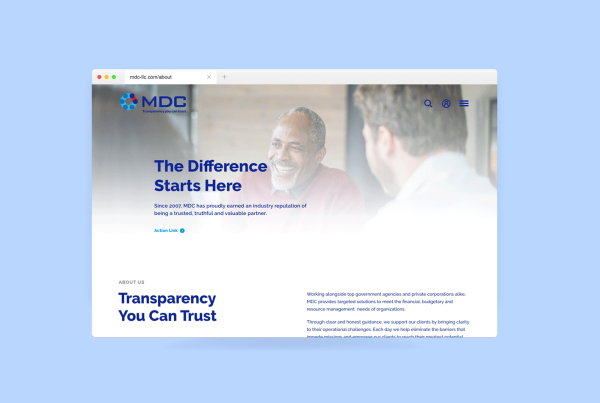 Web browser displaying the MDC business website with a banner headline reading "the difference transparency can make" featuring an image of a smiling man in discussion with another person.