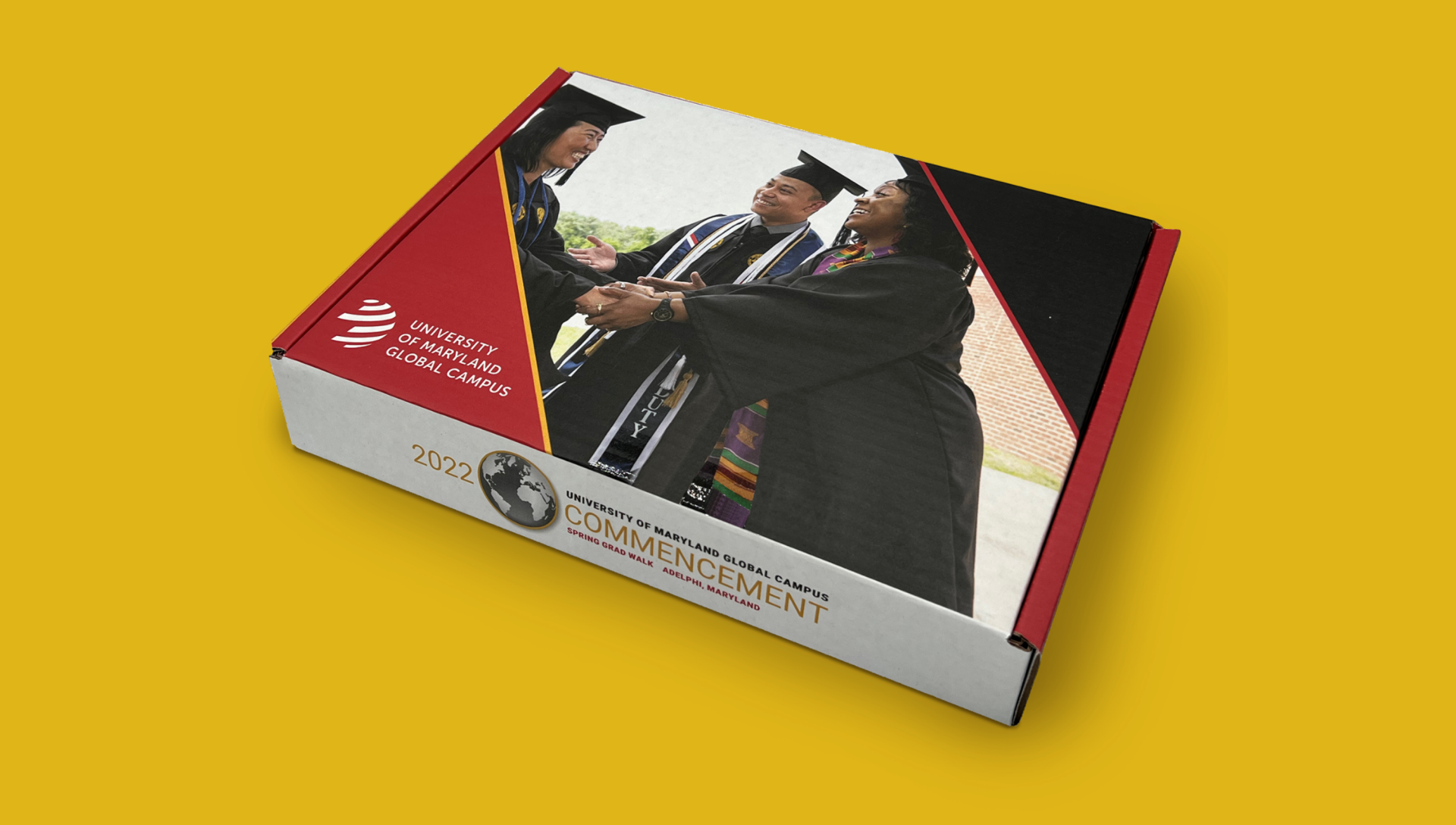 Graduation day: a snapshot of accomplishment and camaraderie, as a new graduate engages in a cheerful interaction with faculty, immortalized on a university's commemorative commencement booklet for the class of
