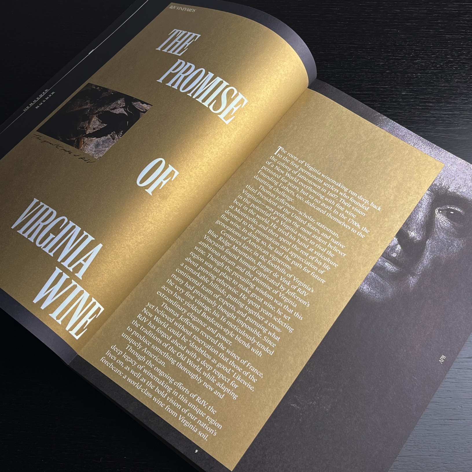 An open magazine featuring an article titled "The Promise of Virginia Wine" with a close-up image of a contemplative face in the shadows on the right page, showcased alongside an exclusive excerpt from "Black
