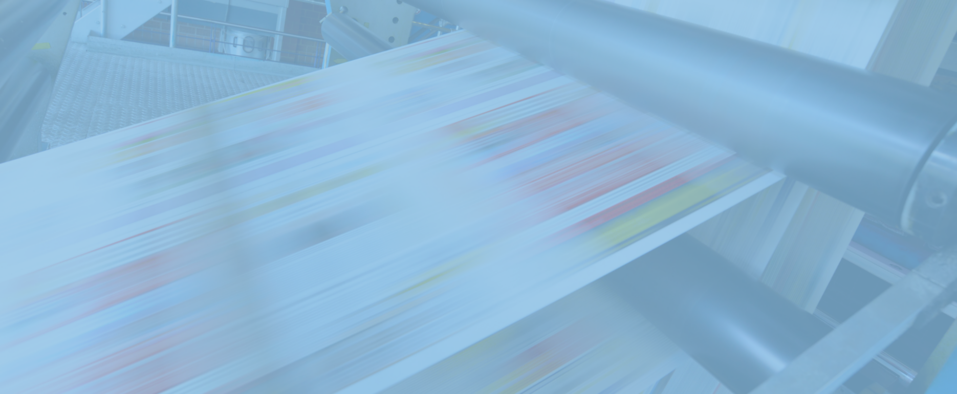 The large printing press whirs to life, swiftly producing colorful pages that blur across its rollers, echoing the vibrant pulse of direct mail trends to watch for in 2025. This high-speed printing process captures the dynamic evolution of print marketing.