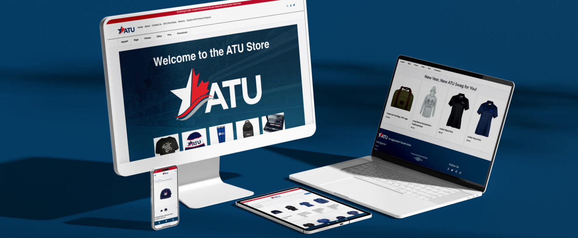 A computer monitor, laptop, tablet, and smartphone display the ATU Store's sleek storefront on a blue surface. The main screen greets visitors with a "Welcome to the ATU Store" message while apparel is showcased across other devices.